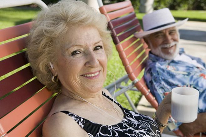 Smiling senior couple outdoors. Smiling senior couple outdoors.