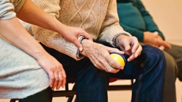 senior being assisted senior being assisted