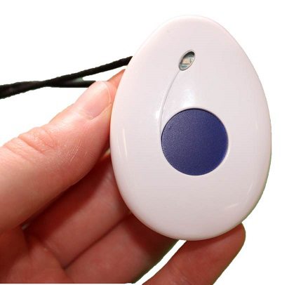 fall detection pendant being held fall detection pendant being held