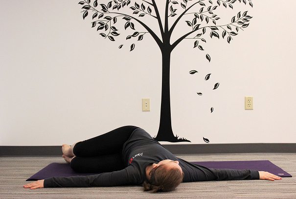 supine twist yoga pose