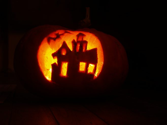 haunted house carved pumpkin