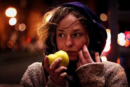 woman eating an apple.alert1