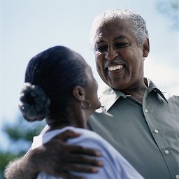 Senior Couple Smiling Outside Senior Couple Smiling Outside