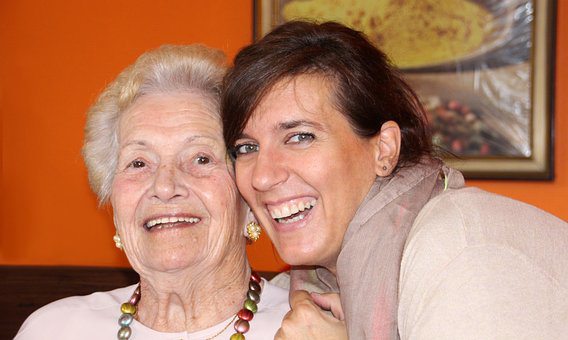 happy mom and daughter laughing happy mom and daughter laughing