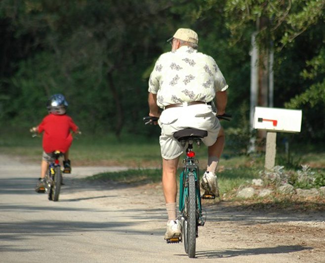 biking grandpa and grandson biking grandpa and grandson