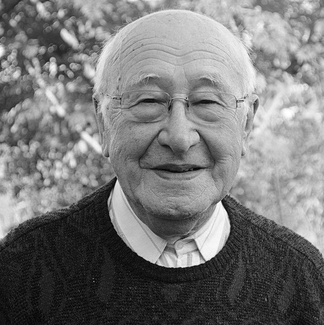 senior looking out window 