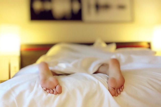 person sleeping in bedroom person sleeping in bedroom