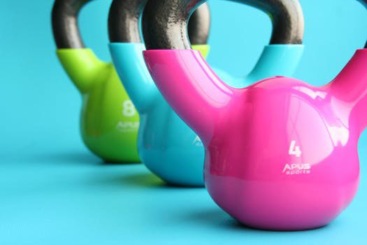 Different colored weights in a row Different colored weights in a row