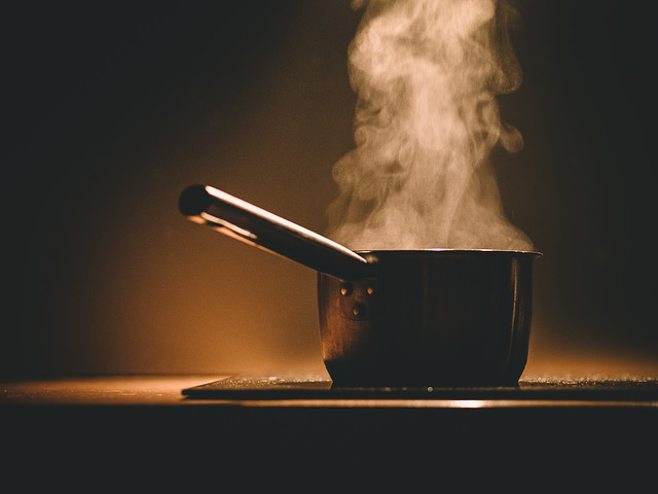 steaming pot on stove