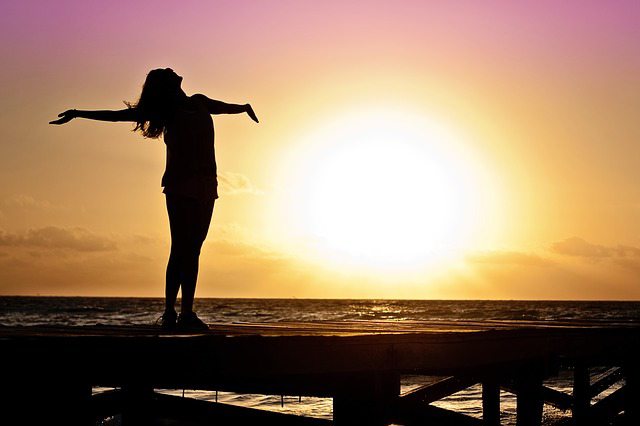 woman_watching_sunrise.alert1 woman_watching_sunrise.alert1
